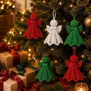 May include: Five handmade crochet angel ornaments in red, white, and green. Each angel features a round head, textured wings, a flared skirt with a scalloped hem, and a small satin ribbon bow at the neck. Each ornament includes a loop for hanging.