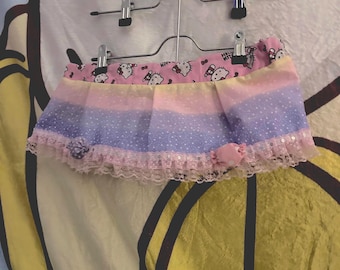 Kawaii godiskjol och matchande kuma-rosett