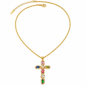 May include: A gold-toned rope chain necklace featuring a cross pendant. The pendant is embellished with multi-colored baguette and round-cut stones in shades of pink, blue, green, and clear, arranged in a vertical and horizontal cross pattern.