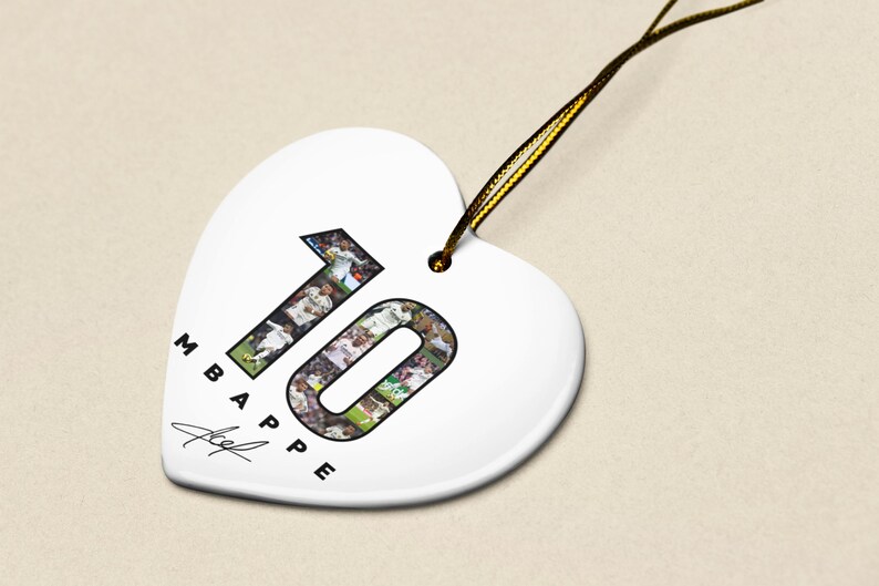 A heart-shaped ornament with the number 10 and the word "MBAPE" printed on it.