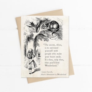 May include: Black and white illustration of Alice from Alice in Wonderland standing in a forest with a Cheshire Cat sitting in a tree above her. The quote reads "The secret, Alice, is to surround yourself with people who make your heart smile. It's then, only then, that you'll find Wonderland." -Lewis Carroll, Alice's Adventures in Wonderland