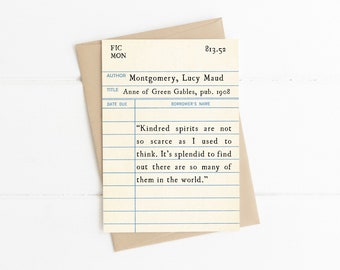 May include: A vintage library card with a quote from the book "Anne of Green Gables" by Lucy Maud Montgomery. The quote reads: "Kindred spirits are not so scarce as I used to think. It's splendid to find out there are so many of them in the world."