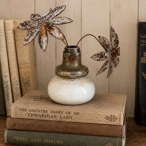Vintage White Porcelain Door Knob with Rusty Metal Daisies ~ Rustic Garden Decor ~ Industrial Farmhouse Sculpture  Cottage Shelf Accent