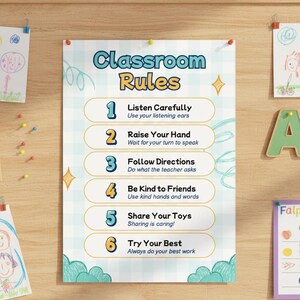 May include: A classroom rules poster with a blue and white checked pattern. The poster displays six rules, including "Listen Carefully" and "Raise Your Hand." The poster is attached to a wooden board with drawing pins.