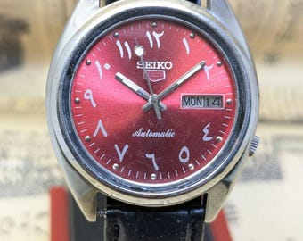 Vintage Seiko 5 Automatic Watch: Red Arabic Dial, Day-Date Japan Made