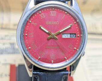 Vintage Seiko 5 Automatic Watch: Red Dial, Day/Date Made in Japan