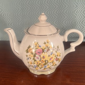 Dainty Vintage Teapot: Floral Ceramic, Silver Accents, Tea for Two