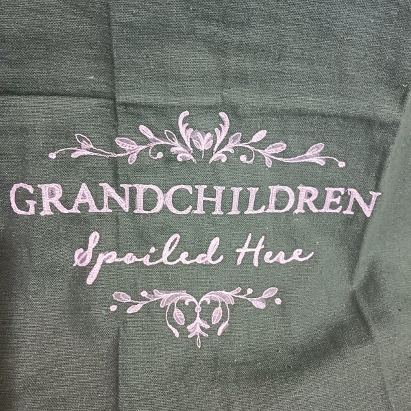 Machine embroidered kitchen towel with grandkids spoiled saying