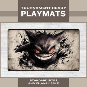 Puede incluir: Alfombrilla de juego rectangular con una ilustración estilizada de Gengar, mostrando una sonrisa amenazante y ojos rojos. La alfombrilla tiene el texto "TOURNAMENT READY PLAYMATS" en la parte superior y "STANDARD SIZES AND XL AVAILABLE" en la parte inferior.