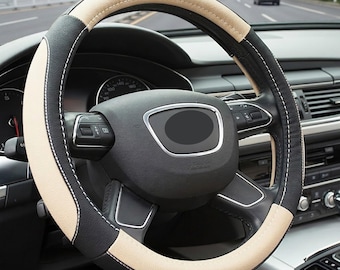 Coprivolante bicolore in similpelle: accessorio sportivo antiscivolo per auto, comfort in tutte le stagioni.
