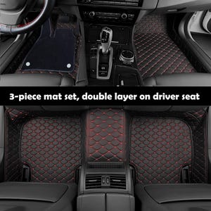 May include: A black car mat set with red diamond stitching. The set includes mats for the front and back seats. The text on the image reads: "3-piece mat set, double layer on driver seat."