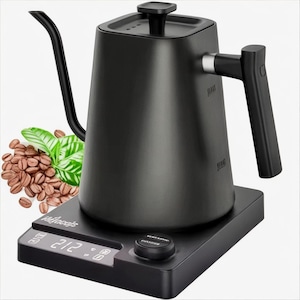 May include: A matte black electric gooseneck kettle with a digital display base. The kettle features a long, slender spout and a handle. Coffee beans and green leaves are in the background. The base displays the temperature.
