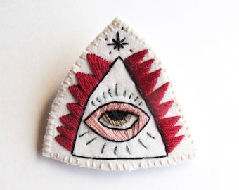Mystic eye brooch hand embroidered on cream muslin with cream felt backing modern embroidery An Astrid Endeavor gifts for her unique jewelry