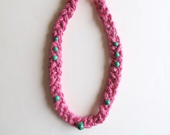 Textile necklace hand knotted and braided using pink soft cotton cording with green malachite beads An Astrid Endeavor Summer fashion