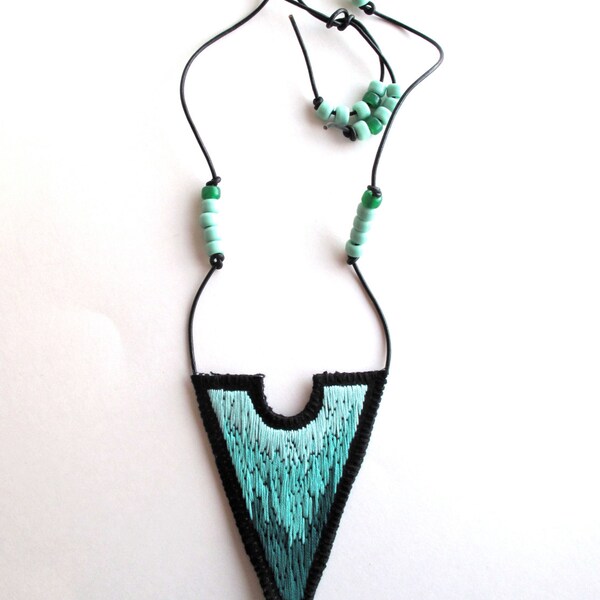 Ombre embroidered necklace in emerald and mint greens on black cotton twill with leather cord and green glass beads