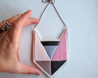 Colorblock embroidered pendant necklace with geometric design light pinks and grays with silver ball chain