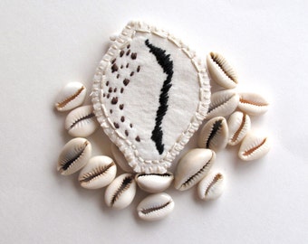 Cowrie shell brooch hand embroidered on cream muslin with cream felt back silver plated pin back textile fiber jewelry Spring fashion