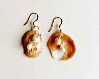 Asymmetrical shell earring set with freshwater pearl and shimmery shell beads from California An Astrid Endeavor summer fashion trends