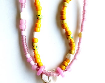 Beaded statement necklace double stranded yellow and pink glass Native American Crow beads with shell focal point on pink leather holiday