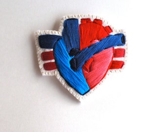 Anatomical heart brooch hand embroidered with reds and blue on cream muslin with cream felt backing Valentines day  MADE TO ORDER