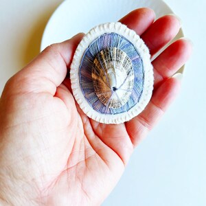 Hand embroidered brooch abstract design using dark lavender variegated threads limpet shell An Astrid Endeavor contemporary fiber jewelry image 2