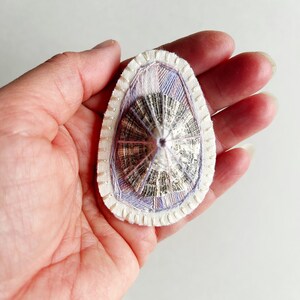 Hand embroidered brooch abstract design using lavender variegated threads and limpet shell An Astrid Endeavor contemporary fiber jewelry image 6