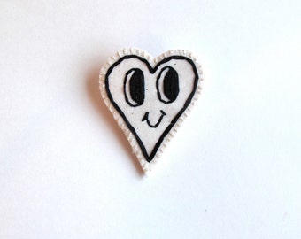 Valentines day brooch hand embroidered heart with smily face in black and white kitsch jewelry An Astrid Endeavor