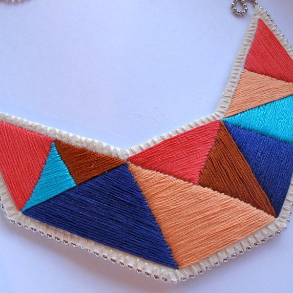 Summer fashion bib necklace embroidered geometric triangles in beautiful blues coral peach and tan colors  dramatic design