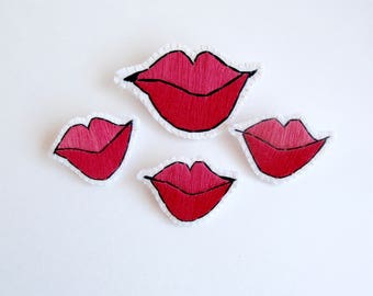 Smiling lips brooch hand embroidered red with black outline on cream muslin with cream felt backing small or large size  An Astrid Endeavor