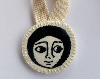 Embroidered Christmas ornament Ethiopian art inspired face