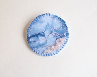 Shibori dyed brooch with hand embroidery and rose quartz beads wool and cotton felt backing indigo Textile jewelry An Astrid Endeavor