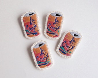 La Croix brooch pin hand embroidered Pamplemousse design with cotton threads on muslin and felt An Astrid Endeavor