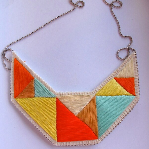 Geometric statement necklace in mint bright yellows tan and orange embroidered triangles dramatic design