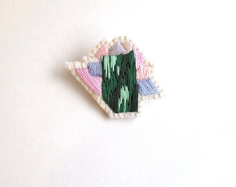 Abstract mineral brooch gem inspiration hand embroidered in ombre green with pink and lavender thread on cream muslin and cream felt