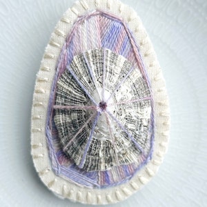 Hand embroidered brooch abstract design using lavender variegated threads and limpet shell An Astrid Endeavor contemporary fiber jewelry image 5