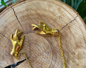 Vintage style collar brooch magic hand palms palmistry in golden color, witches hands