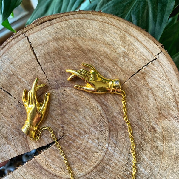 Vintage style collar brooch magic hand palms palmistry in golden color, witches hands