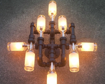 Wall Light. Sconce. Beer bottles. Plumbing pipe & fittings.