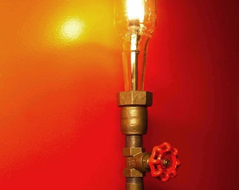 Wall Light. Lamp. Beer bottle, Plumbing pipe & fittings. Wall light .  Lighting Fixture. Sconce