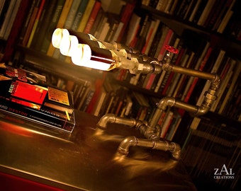 Desk lamp. Beer bottles,  Plumbing pipe & fittings. Table lamp.