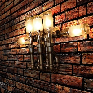 Wall Lamp. Beer bottles. Plumbing pipe & fittings. Wall light. Lighting Fixture. Sconce.