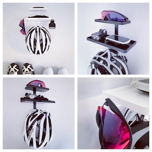 May include: A collection of cycling gear, including a white and black helmet, sunglasses, a bike light, and shoes. The items are displayed on a wall-mounted shelf system, showcasing a modern and organized approach to storage.