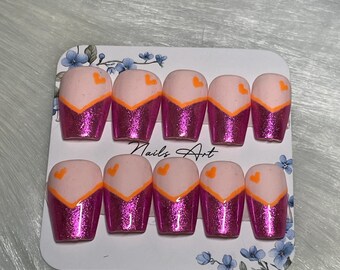 Square short Chevron-style french tip with hearts