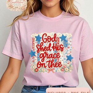 May include: A light pink t-shirt featuring the phrase "God Shed His grace On thee" in red script. The design includes a floral and patchwork pattern with blue star accents. The text "INCLUDES : PNG FILE" is at the bottom.