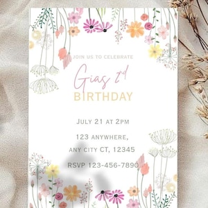 May include: A white birthday invitation with floral illustrations in pink, yellow, and orange. The text reads "Join us to celebrate Gias' 1st Birthday" with event details. RSVP information is also included.