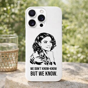 May include: White phone case featuring a black and white illustration of a woman with the text "WE DON'T KNOW-KNOW BUT WE KNOW." The case has a glossy finish and a camera cutout.