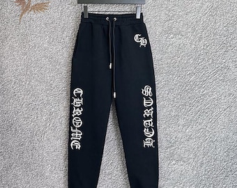 Pantalones deportivos negros de estilo urbano, pantalones de chándal unisex informales.