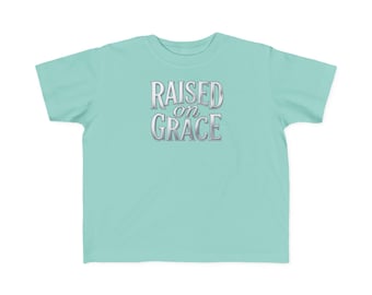 Camiseta infantil "Criados en la gracia" - Fe cristiana para niños