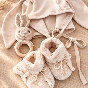 gender neutral boy girl baby gift set with bunny ears and booties. baby gift set ideas