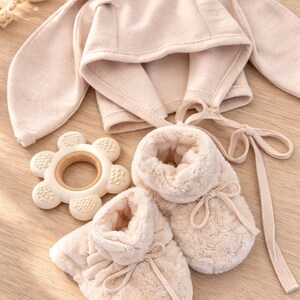 gender neutral boy girl baby gift set with bunny ears and booties. baby gift set ideas